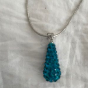 Silver necklace with sapphire pendant, 18” blue teal teardrop stones present